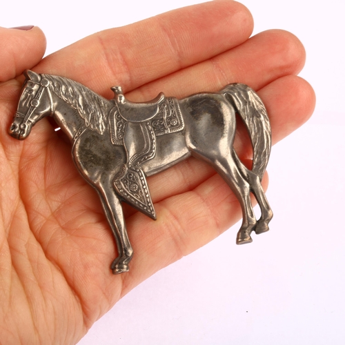 1343 - A large Continental sterling silver cowboy horse brooch, length 67mm, 15.4g