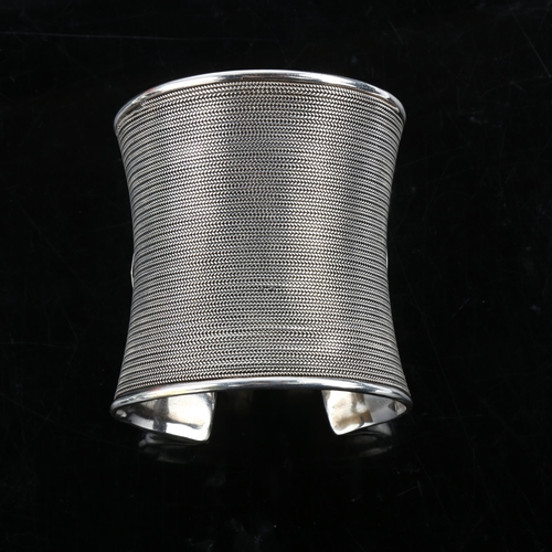 1347 - A large and heavy sterling silver mesh cuff bangle, import hallmarks London 1991, length 7cm, intern... 