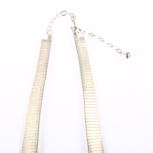 1350 - A modern sterling silver fringe necklace, textured decoration, length 45cm, 34.7g