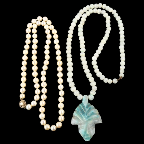 1352 - 2 necklaces, comprising single-strand cultured pearl example with 9ct clasp, length 60cm, and a Maya... 