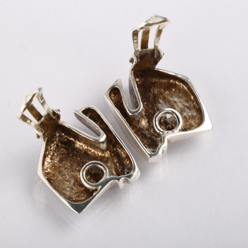 1369 - CLAUS GEORG MELCHER - a pair of Danish brutalist sterling silver abstract clip-on earrings, height 2... 