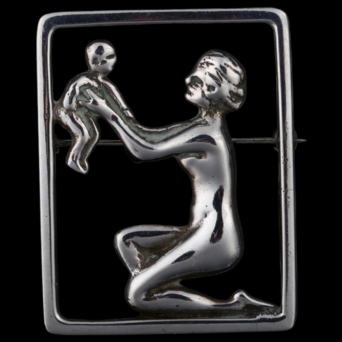 1376 - C C CHRISTENSEN - an Art Deco Danish silver figural mother and child openwork brooch, height 51mm, 1... 