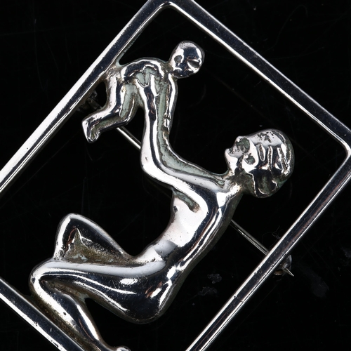 1376 - C C CHRISTENSEN - an Art Deco Danish silver figural mother and child openwork brooch, height 51mm, 1... 