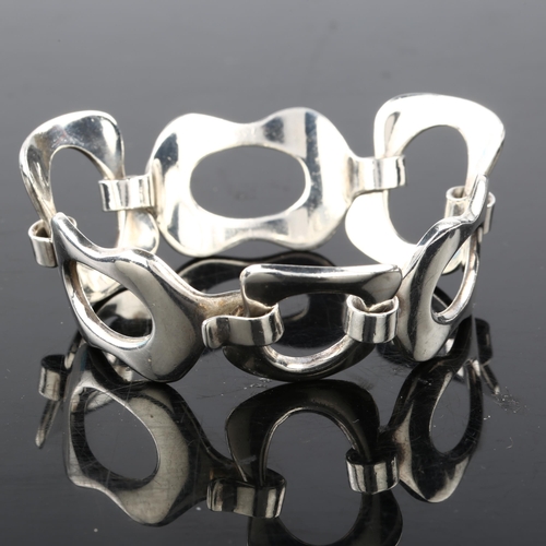 1381 - BUCH & DEICHMANN - a heavy Danish modernist sterling silver abstract panel bracelet, designed by Jac... 