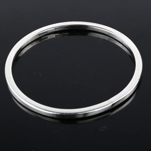 1385 - CARL OVE FRYDENSBERG - a Danish modernist sterling silver plain form slave bangle, band width 3.6mm,... 