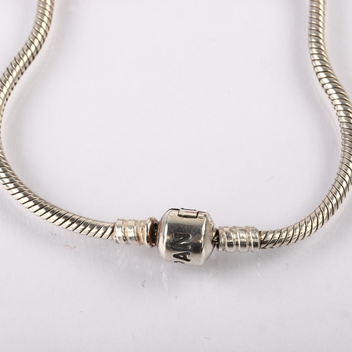 1393 - PANDORA - a sterling silver snake link charm bracelet, with 5 silver charms, length 19cm, 33.7g, box... 