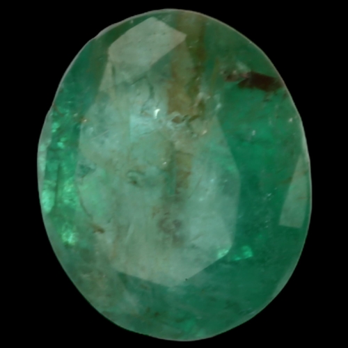 1403 - A 0.75ct unmounted oval mixed-cut emerald, 6.60 x 5.83 x 4.07mm, with GLA report card