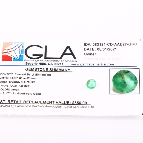 1403 - A 0.75ct unmounted oval mixed-cut emerald, 6.60 x 5.83 x 4.07mm, with GLA report card