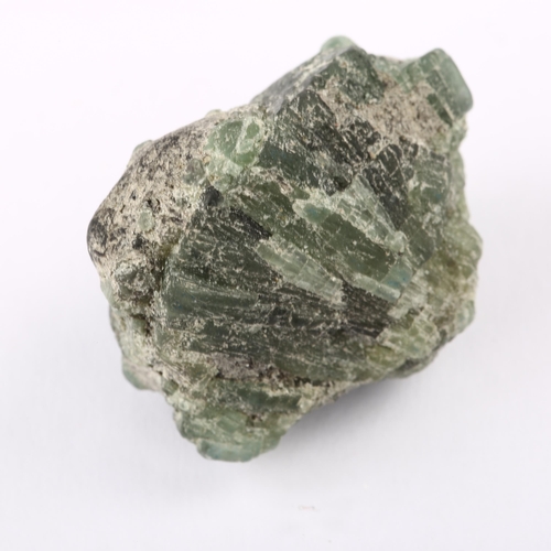 1406 - An 83.14ct emerald rough, 17.46 x 21.80 x 31.66mm, with IDT gemstone report