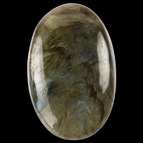 1408 - A 76.40ct unmounted oval cabochon labradorite, 43.23 x 27.42 x 7.86mm, with IDT gemstone report