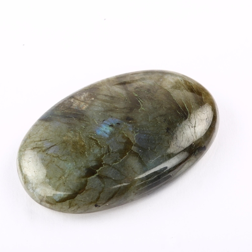 1408 - A 76.40ct unmounted oval cabochon labradorite, 43.23 x 27.42 x 7.86mm, with IDT gemstone report