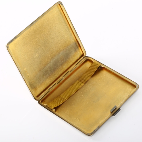 1456 - DUNHILL - an Art Deco George VI silver cigarette case, allover engine turned decoration with gilt in... 