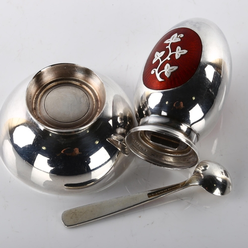 1460 - MEKA - a Danish modernist sterling silver and red enamel cruet set, comprising egg-shaped pepperette... 