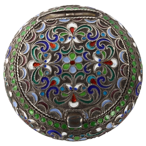 1461 - A Russian silver and champleve enamel circular pillbox, allover floral wirework decoration with gilt... 