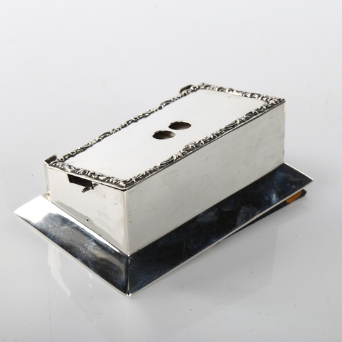 1468 - An Edwardian silver perpetual desk calendar, rectangular form with date windows and relief embossed ... 