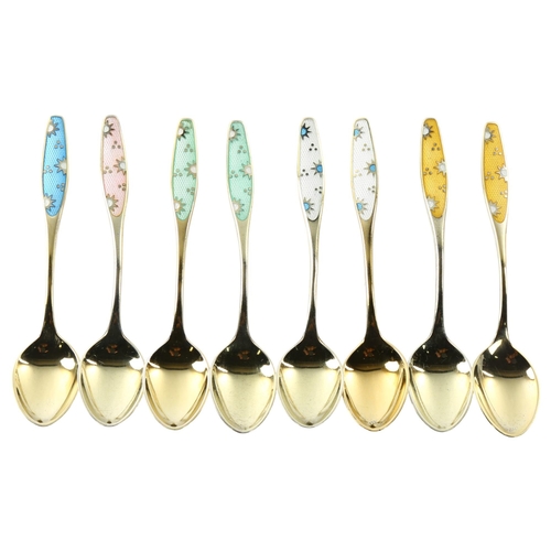 1475 - FRIGAST - a set of 8 Danish vermeil sterling silver and harlequin enamel coffee spoons, with sun des... 