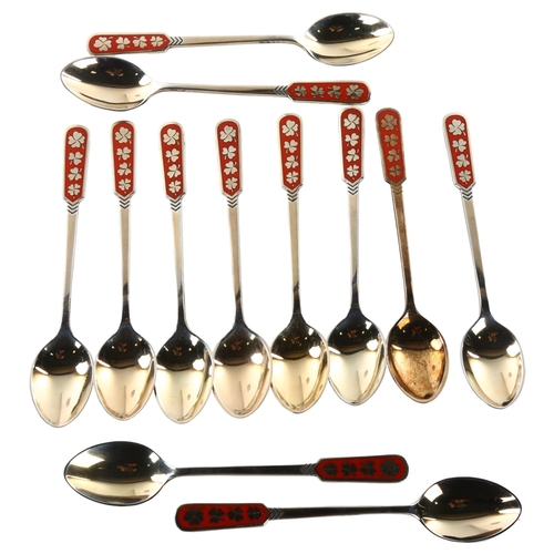 1478 - EGON LAURIDSEN - a set of 12 Danish vermeil sterling silver and red enamel coffee spoons, with shamr... 