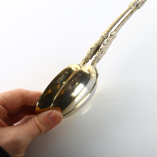 1481 - A large pair of George V silver anointing spoons, gilded and engraved bowls, by Wakely & Wheeler, ha... 