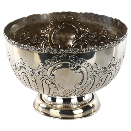 1490 - An Edwardian silver pedestal rose bowl, relief embossed foliate and half-fluted decoration, by Henry... 