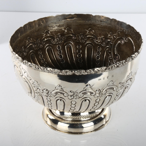 1490 - An Edwardian silver pedestal rose bowl, relief embossed foliate and half-fluted decoration, by Henry... 