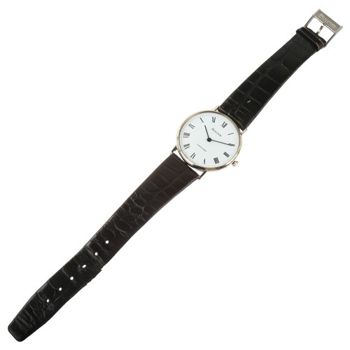 1040 - BULOVA - a stainless steel Longchamp mechanical wristwatch, white dial with Roman numeral hour marke... 