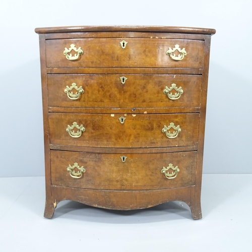 2021 - An antique walnut bow front chest of four drawers. 70x79x48cm.