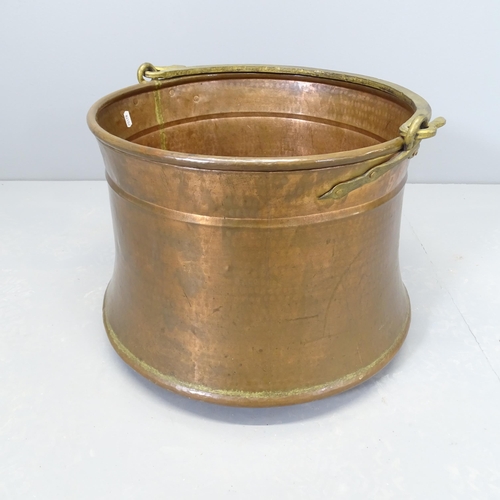 2504 - A large George III copper log bucket / cauldron. Overall diameter 55cm, top 45cm. Height 37cm.