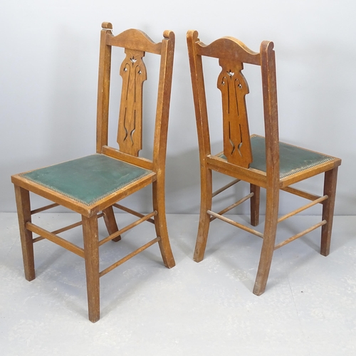 2506 - A set of of four oak framed Arts & Crafts style dining chairs.