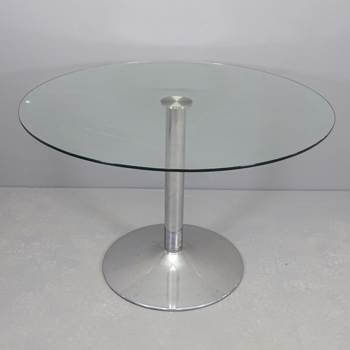 2508 - A contemporary circular glass-topped table on chrome base. 110x72cm