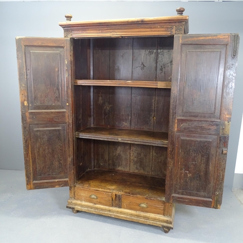 2511 - An Indian hardwood two-door wardrobe with shelf fitted interior and two frieze drawers to base. 100x... 