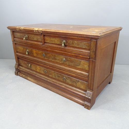 2513 - An early 20th century oak low chest of two short and two long drawers. 127x68x62cm