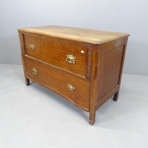 2514 - An early 20th century oak low chest of two long drawers. 101x68x50cm