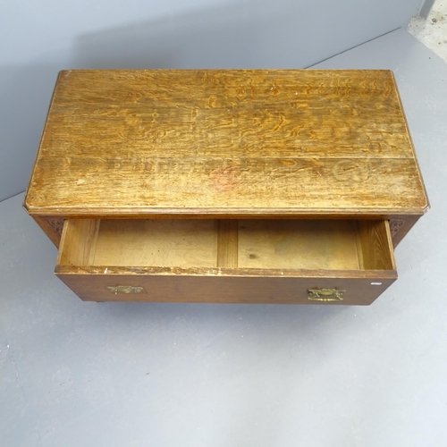 2514 - An early 20th century oak low chest of two long drawers. 101x68x50cm