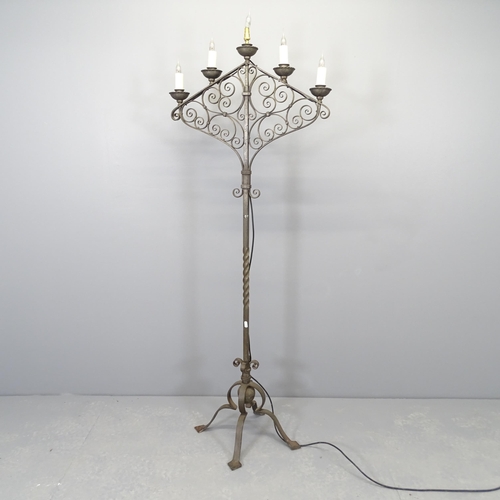 2520 - A wrought metal electric five light candelabra. Height 168cm.