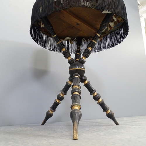 2523 - An antique ebonised Gypsy table, with turned legs and tasselled silk cover. 53x62cm