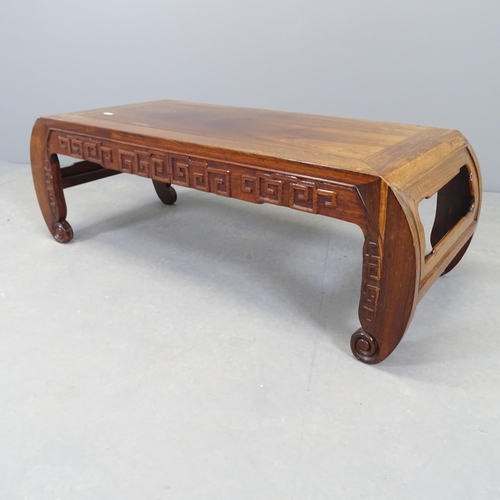 2531 - A Chinese elm opium table, with carved decoration. 101x33x42cm.