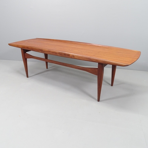 2247 - A mid-century Danish style teak coffee table. 151x45x49cm