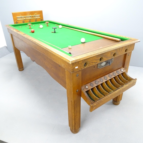 2532 - An early 20th century bar billiards table, with cues, balls and scoreboard, operated on a sixpence (... 