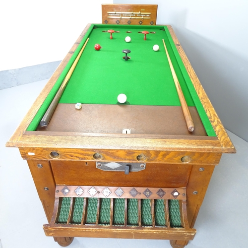 2532 - An early 20th century bar billiards table, with cues, balls and scoreboard, operated on a sixpence (... 