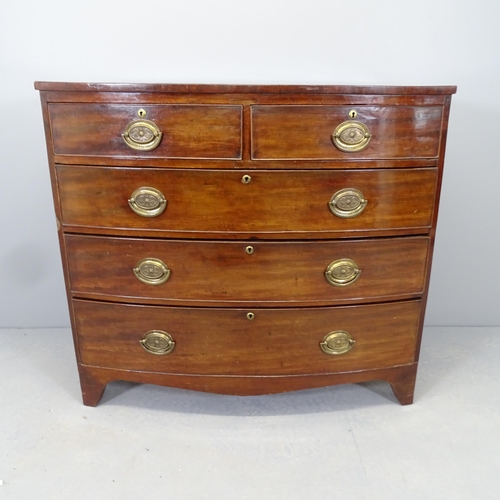 2535 - A Georgian crossbanded mahogany bow front chest of two short and three long drawers. 104x94x50cm