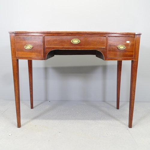 2536 - A 19th century mahogany knee-hole bow-front desk, with three frieze drawers and raised on square tap... 