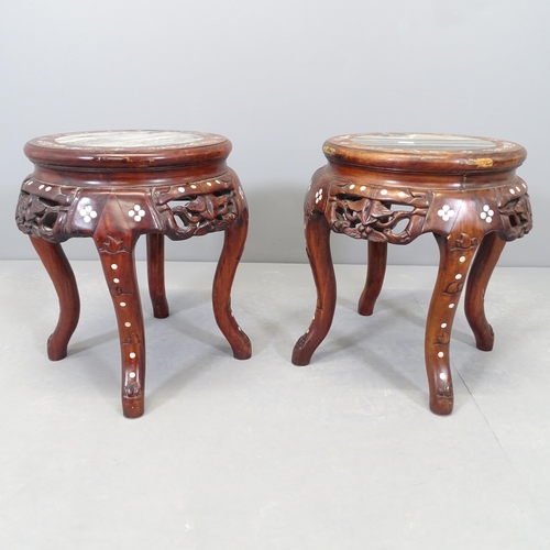 2537 - A pair of Chinese hardwood marble topped plant stands, with carved and mother of pear inlaid decorat... 