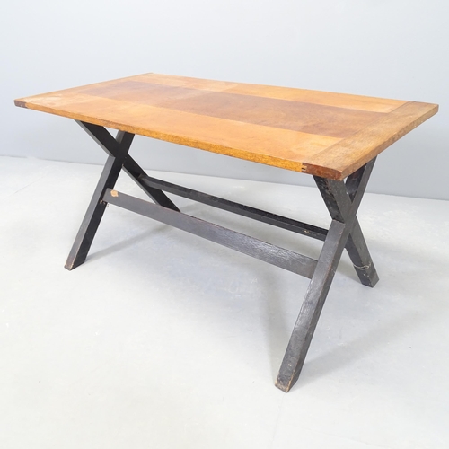 2540 - A modern teak plank-top coffee table on x-frame base. 88x48x47cm