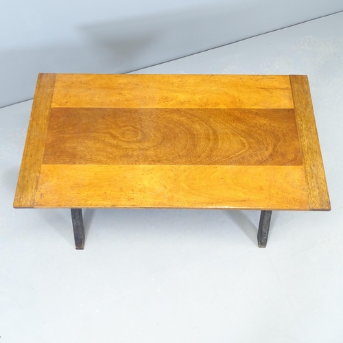 2540 - A modern teak plank-top coffee table on x-frame base. 88x48x47cm