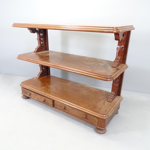 2545 - A Victorian mahogany three-tier buffet, with two drawers, carved and pierced decoration and raised o... 