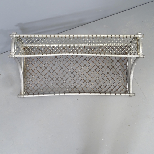 2573 - A mid-century chrome railway luggage rack. Length 92cm