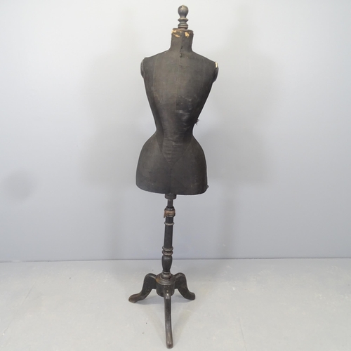 2576 - A vintage wasp-waisted shop display mannequin on stand. Height 153cm.