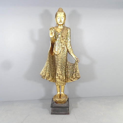 2586 - A large gilt painted resin figure of a buddha on plinth, with applied cut mirrored glass decoration.... 