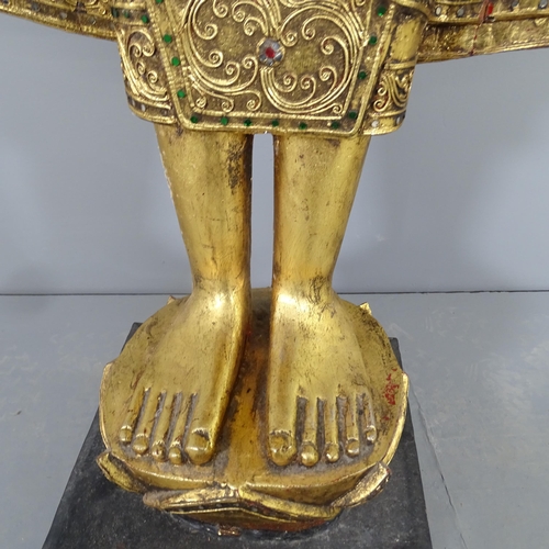 2586 - A large gilt painted resin figure of a buddha on plinth, with applied cut mirrored glass decoration.... 