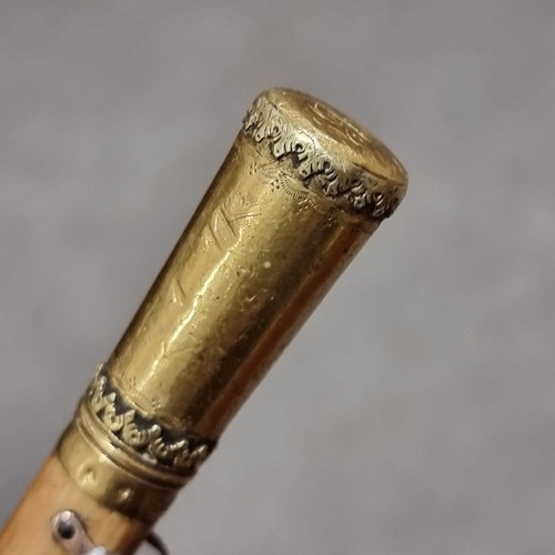 229 - An 18th century gold-topped swagger stick, hallmarked for 1783, maker CM, probably Charles Mappin, w... 